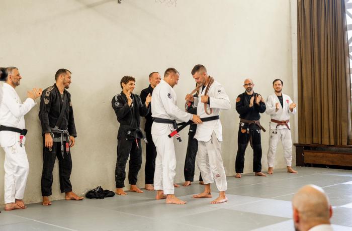 Receiving my Black belt from Markus Schmidt at the Fightzone Summer Camp 19.08.23
