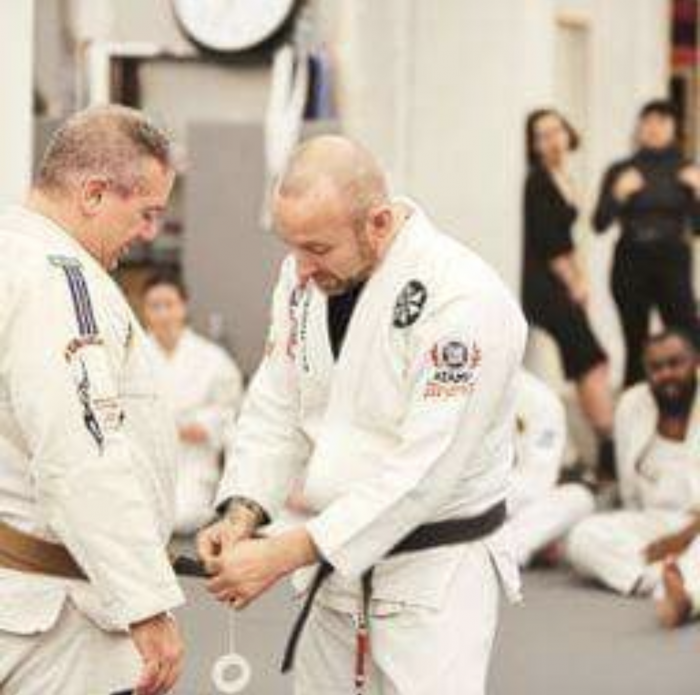 Me getting a stripe or two at Brown belt from Coach Desimone