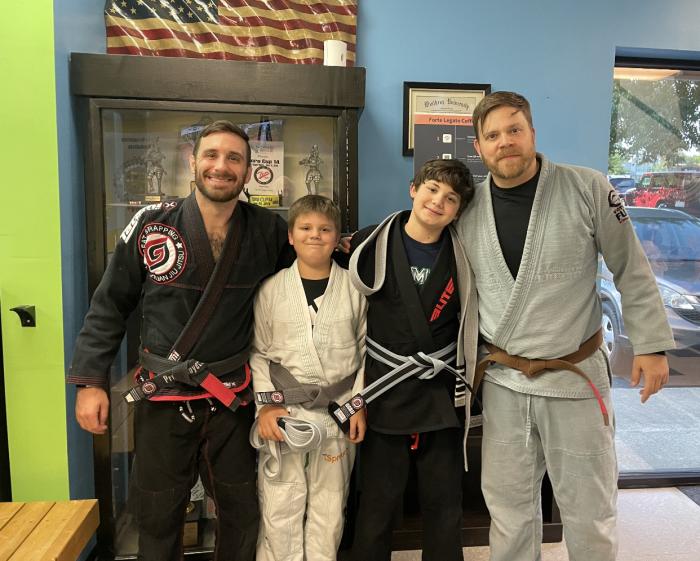 Helping coach kids class and my boys got promotions (with Proff. Evan Goyette)