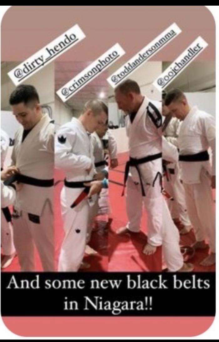 Others promoted to black belt same day.