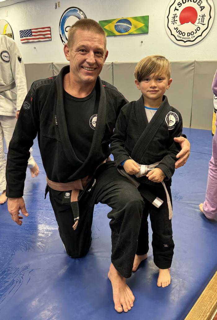 Coach Trever and Tristan “Mighty Mouse” at his Grey-White belt promotion.