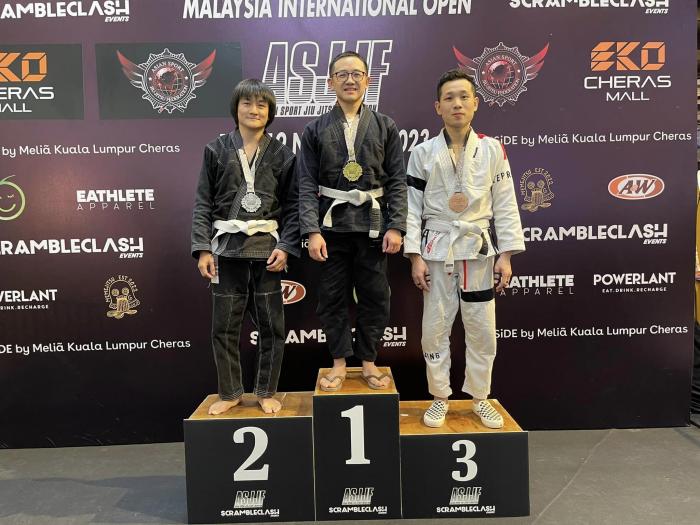 Podium pic at the Asian Sports Jiu-Jitsu Federation Malaysia 2023 tournament: I took home the Gold medal in the Masters 1 -64kg gi division with no points scored on me.