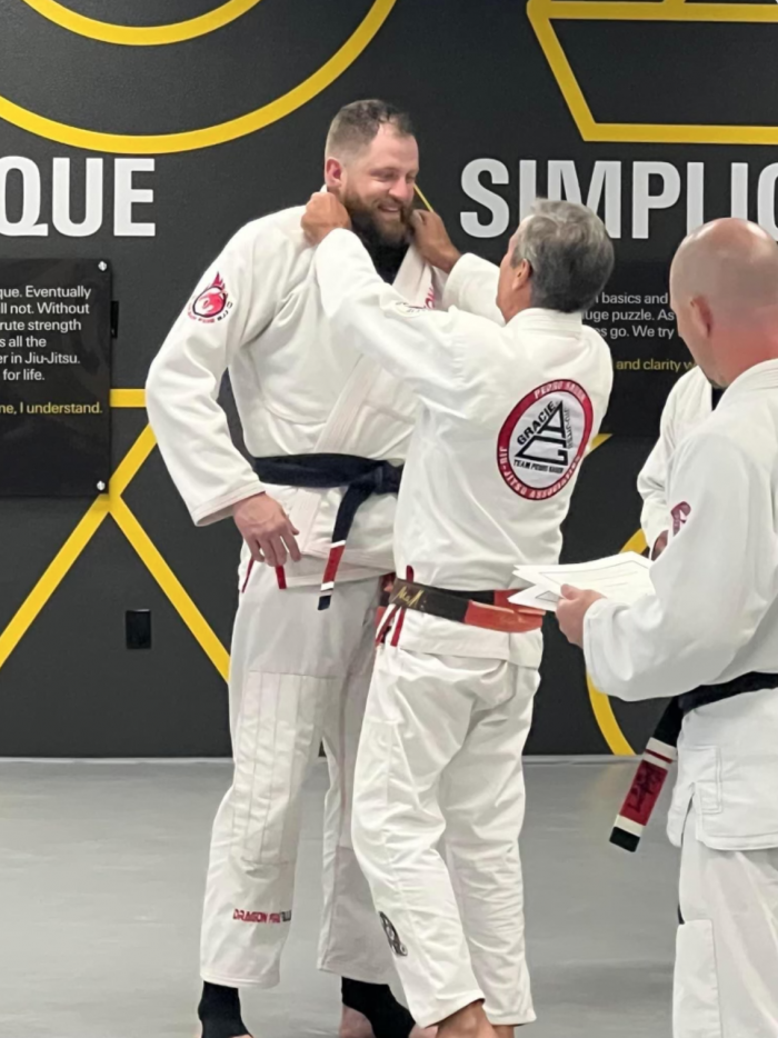 Receiving my 1st Degree Stripe on April 28, 2023 at Team Rhino Headquarters from Master Sauer.