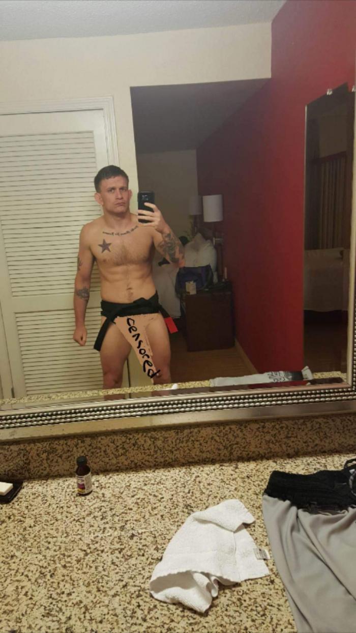 A photo of me wearing my black belt, as requested