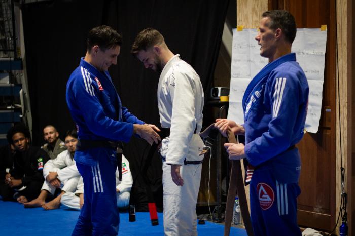 Receiving my blackbelt in 2023 by my professors
