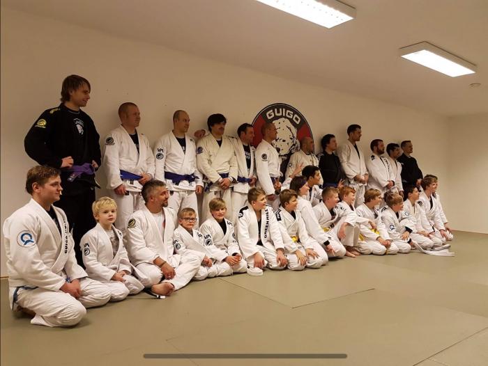 Me (1 back from left) as a purple belt (2017)