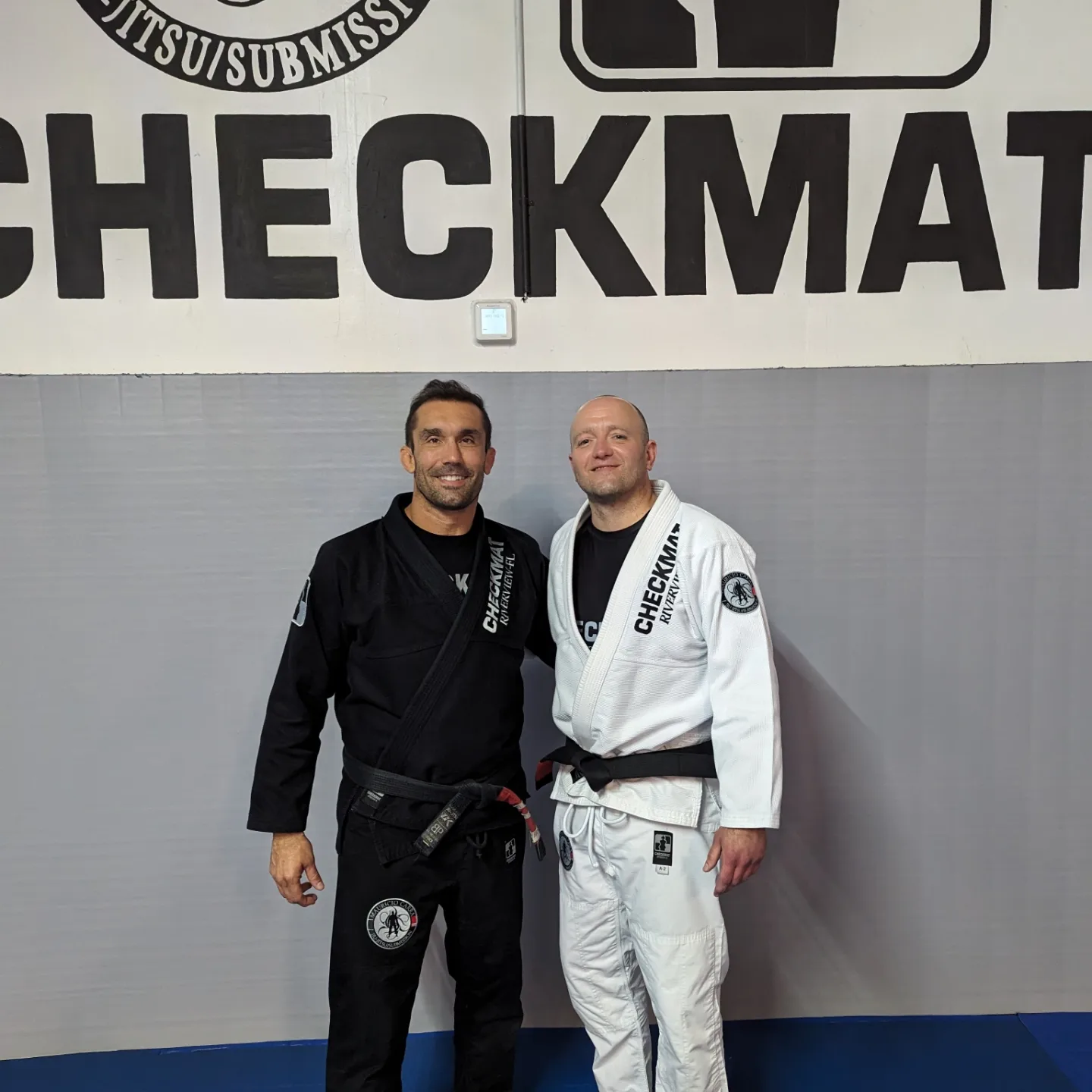 Black belt promotion with Mauricio Carra