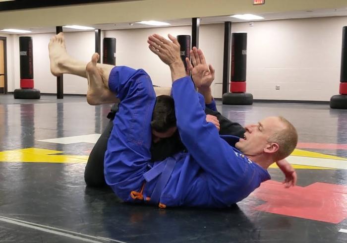 Demostrating a triangle at the VMI BJJ Club practice
