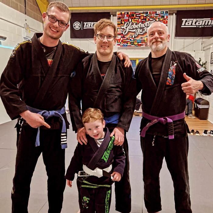My son getting his first stripe.
