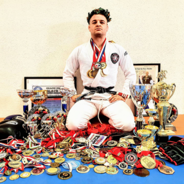 Posing with some of my Medals & Trophies