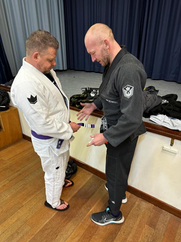 Purple belt 4th stripe coach