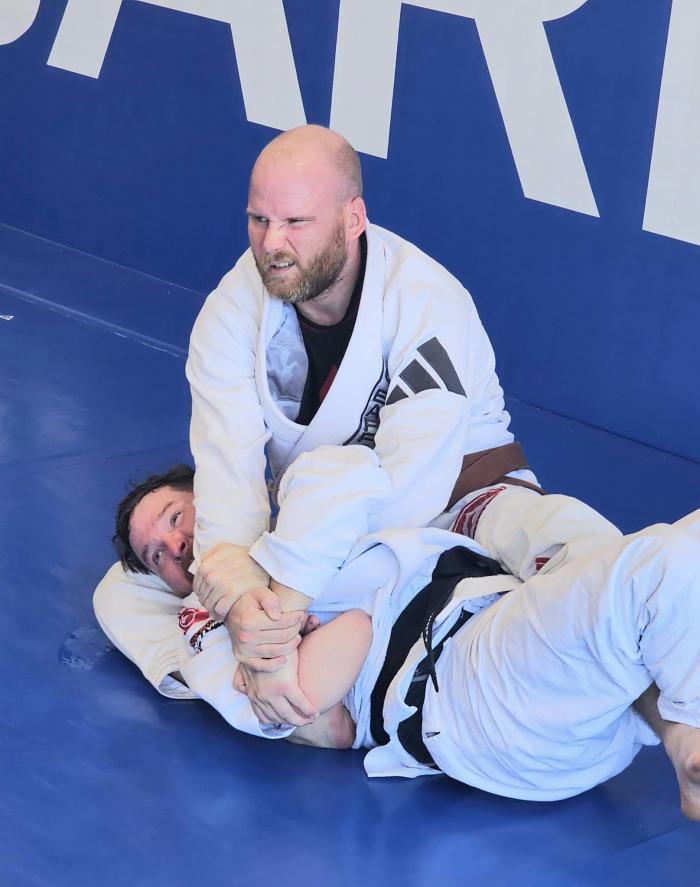 Promotion Day Roll, watching a white belt get heel hooked (Probably)
