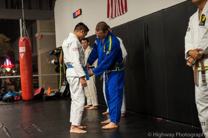 Receiving a stripe from Prof Marcello Bergo of Brazilian Top Team