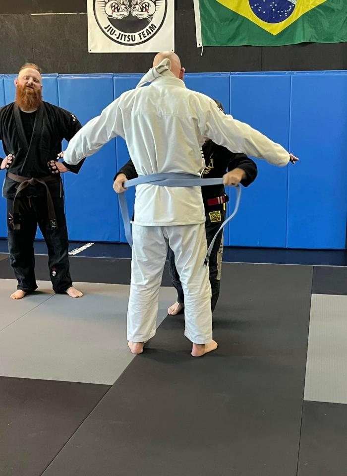 My Blue Belt promotion. Coach Perkins putting my Blue on me 4/13/24