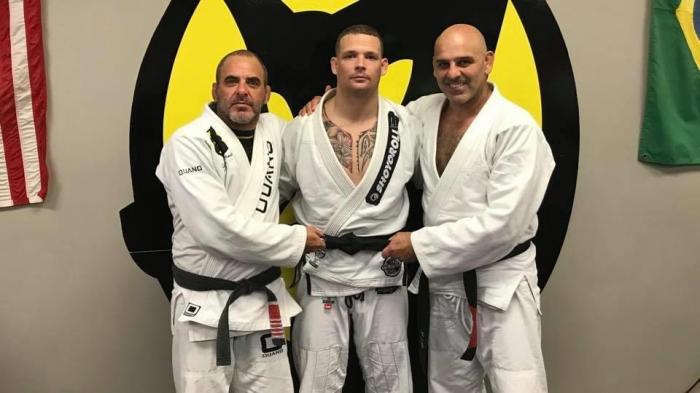 The day I received my black belt from Professor Gustavo Machado with Master Gordo present