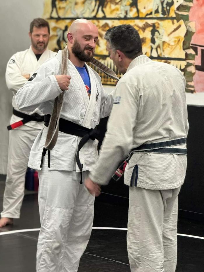 Receiving the black belt (Nov '23)