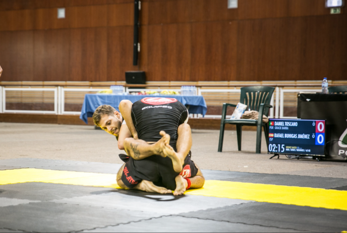 Working the kimura rasp in search of the points when activated on the scoreboard (ADCC rules). This photo was taken at the ADCC in Portugal in 2022.