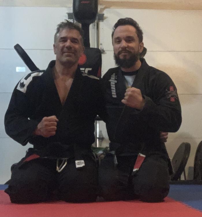 Coach Frank Rodriguez and I after some intense drilling.