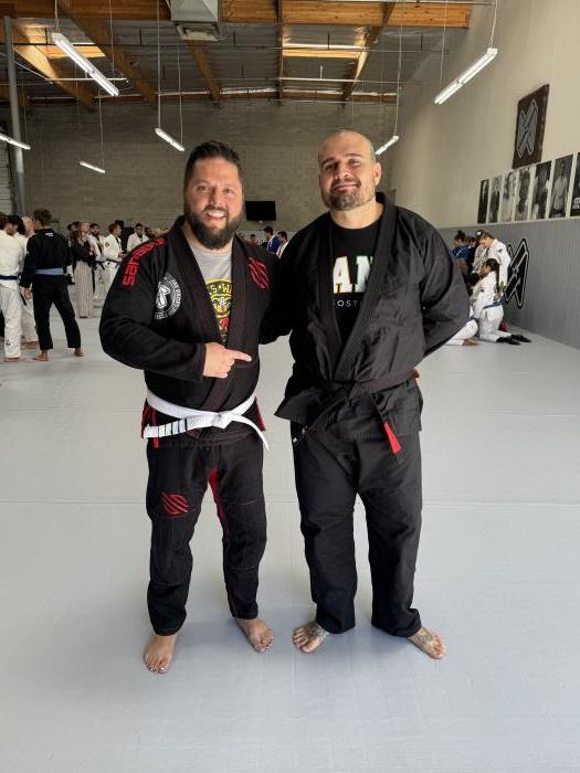 Another stripe for me and a black belt for the homie