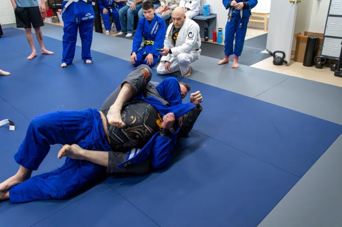 A friend armbarring me during my shark tank