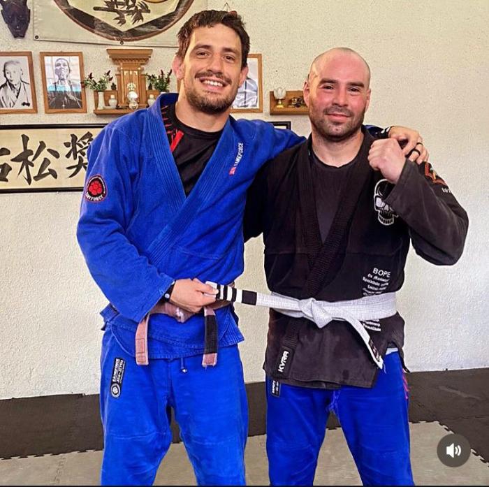 Third-degree graduation in white belt.