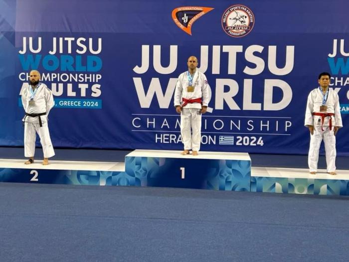 Winning gold at the JJIF world champs. First time holding the rank and title "world champion"