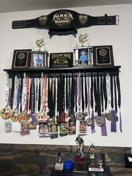 Some of my awards for fighting and grappling from a young g age