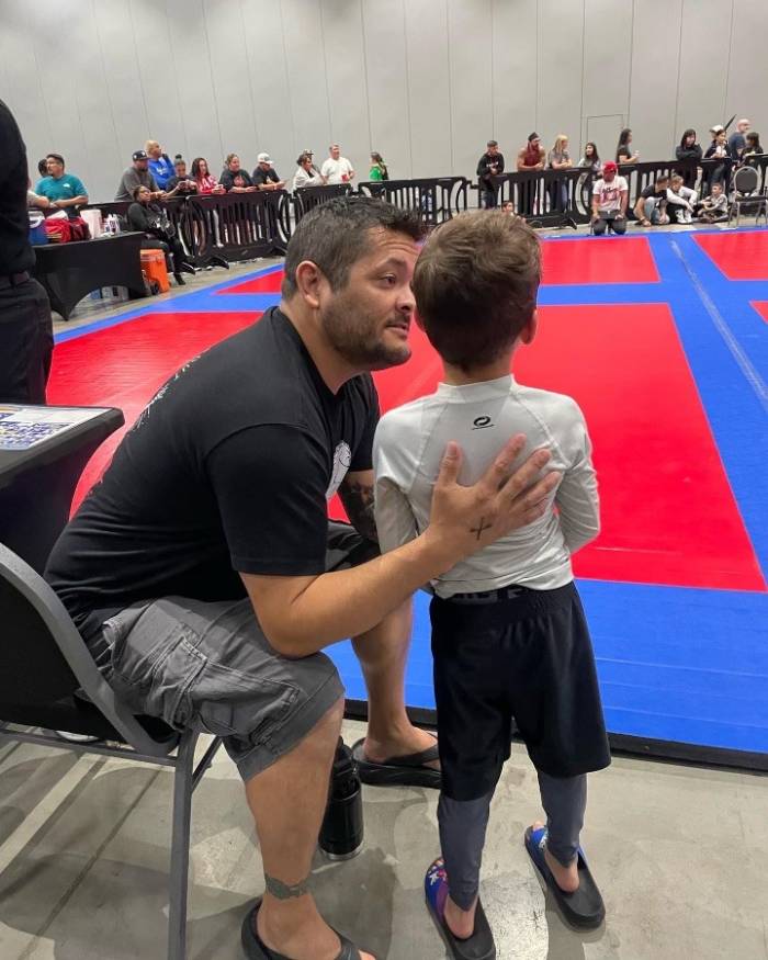 Coaching my son in a NoGi match