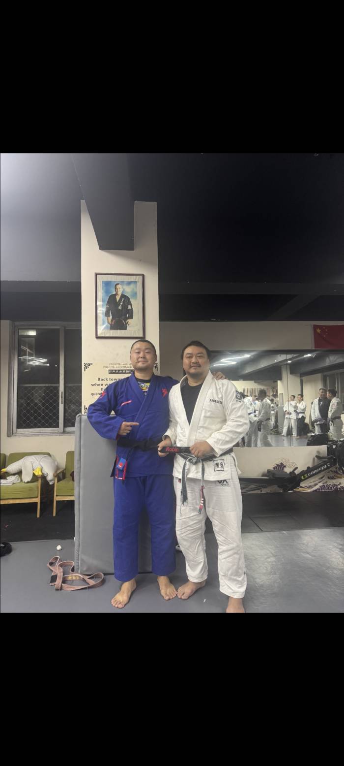 Robin getting his black belt