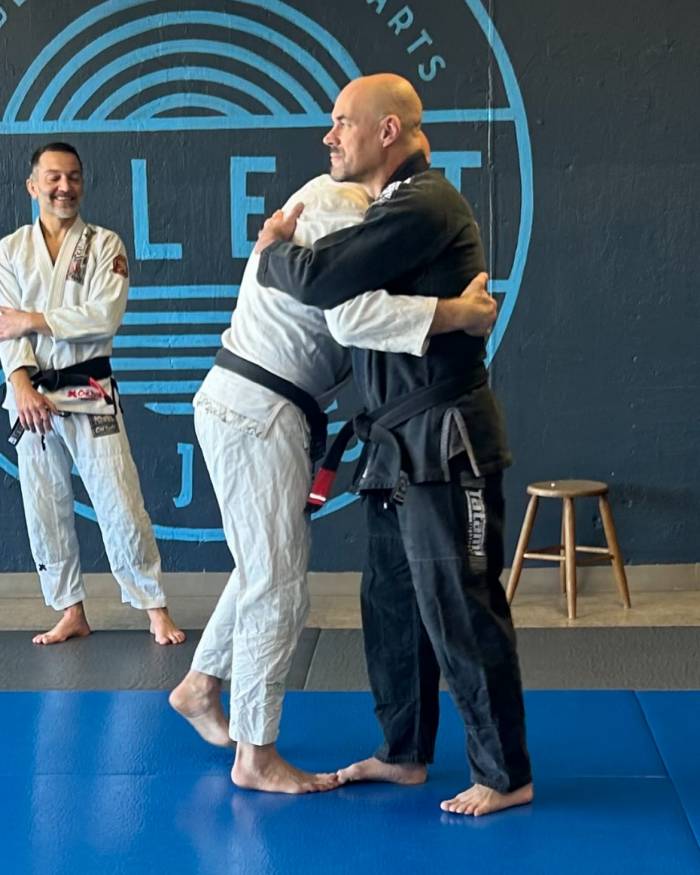 Receiving my first stripe from my instructor, Lance Yager.