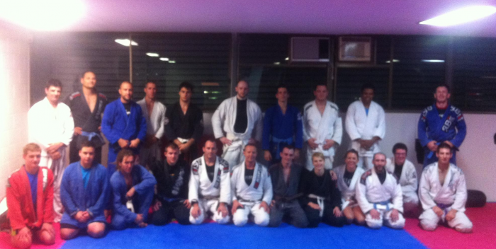 Newly promoted blue belt ( black gi 4th bottom left) under Coach Rob Moffatt (next to me in white gi) ( Black belt under Peter de Been) Oct 2012 at Fusion Fight and Fitness Cairns