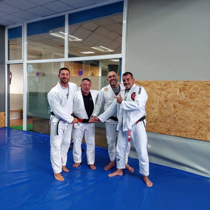 Receiving the black belt.