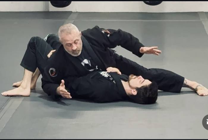 Technique demonstration and explanation during a side control seminar I taught at Conquest BJJ in Millersville, Md
