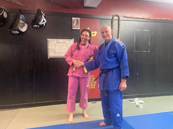 Receiving my yellow belt in Judo at wild geese judo in Dublin