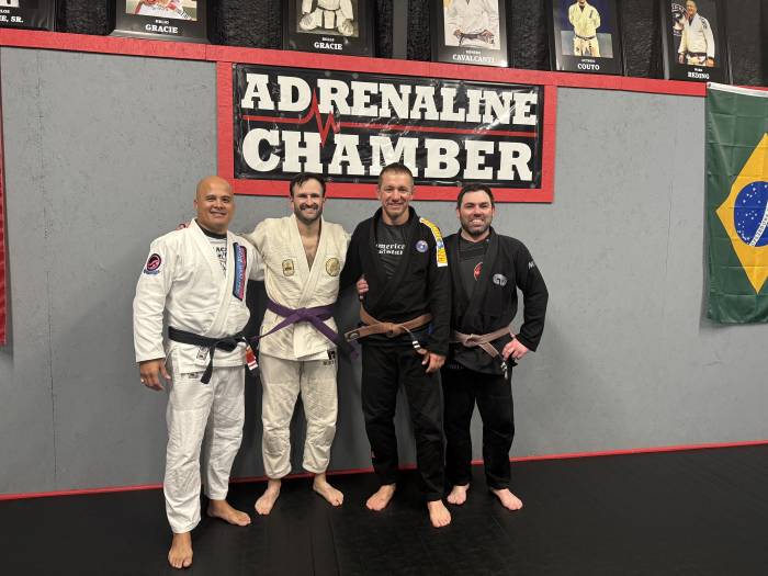 Promotion with professor Tony Cruz and coaches Mike Stewart and Drew Schmidt