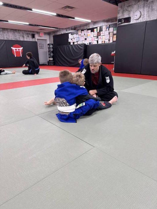 Showing the little grapplers how to lock down back control