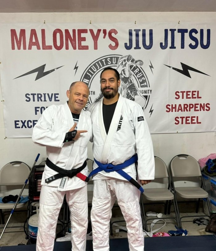Promoting one of my students (Shaun) to blue belt