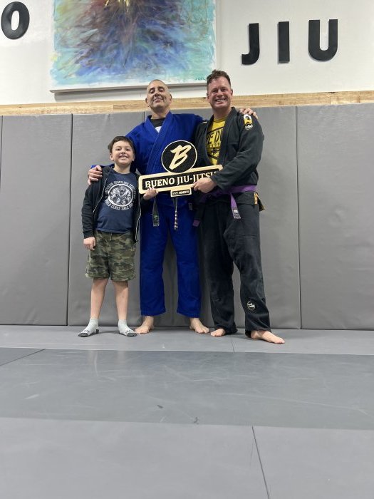 Presenting coach with a wood sign we made at our last class in Texas. - 2026