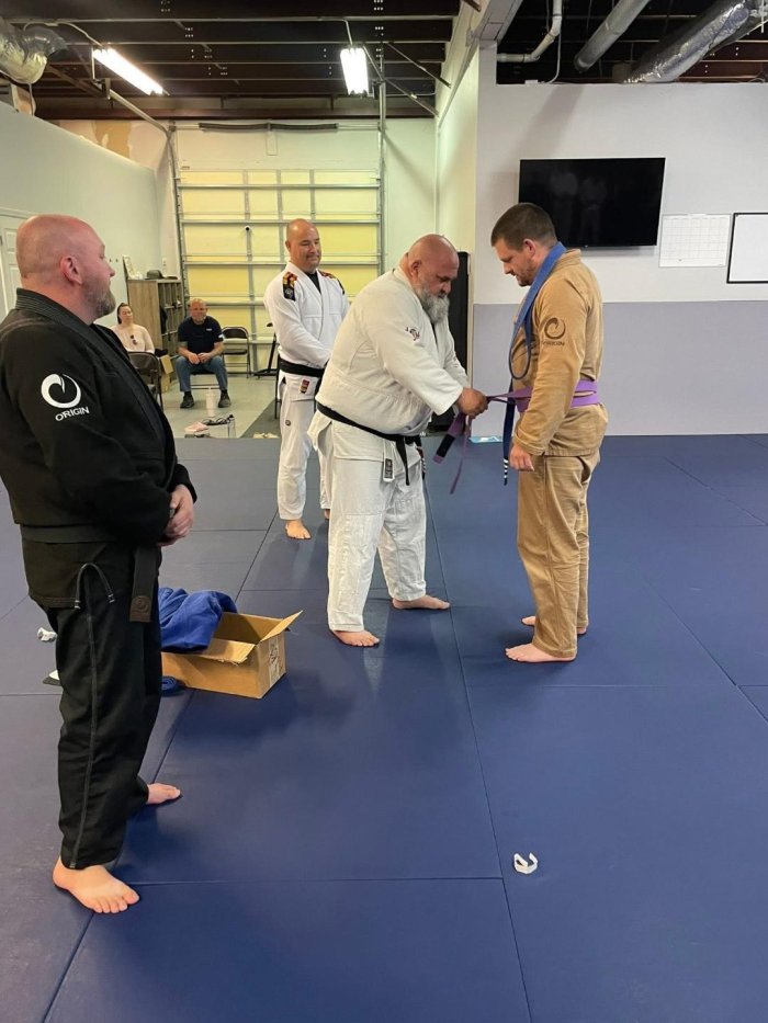Purple belt · April 20, 2026 · Promoted by christopher popdan