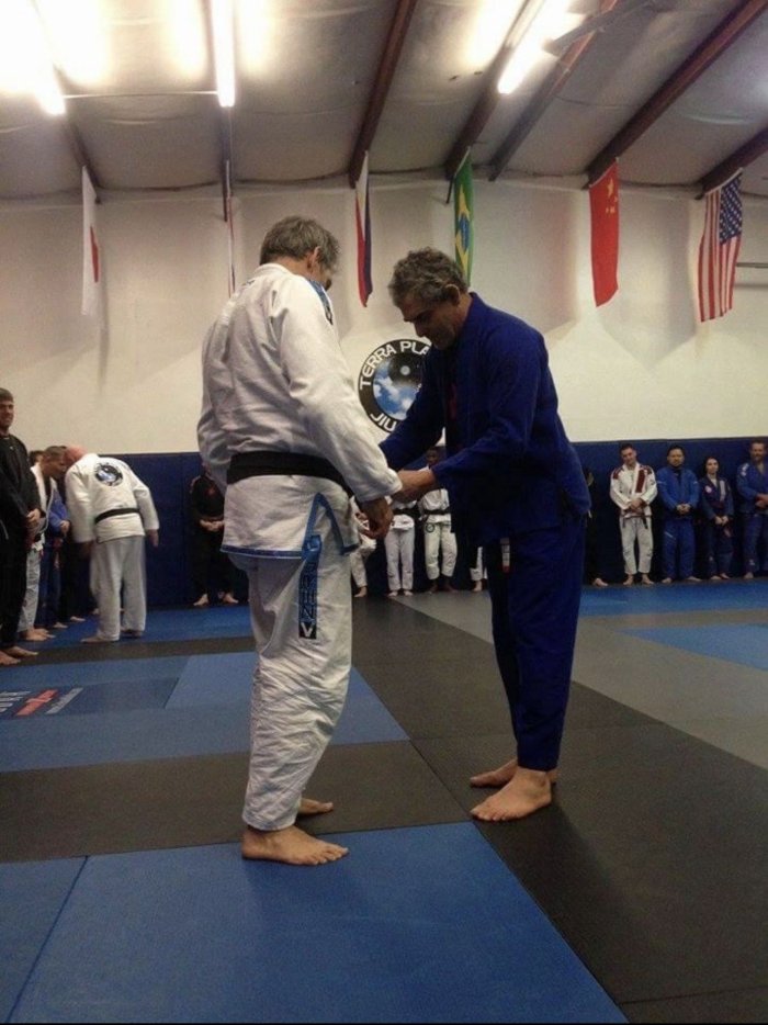 John Boltin receiving his 2nd stripe from Eduardo De Lima (2016)