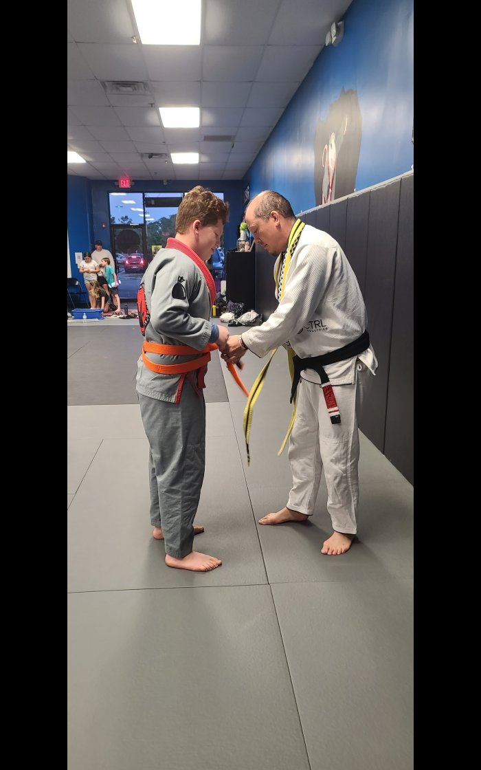 Orange belt · April 16, 2025 · Promoted by Christopher Garza