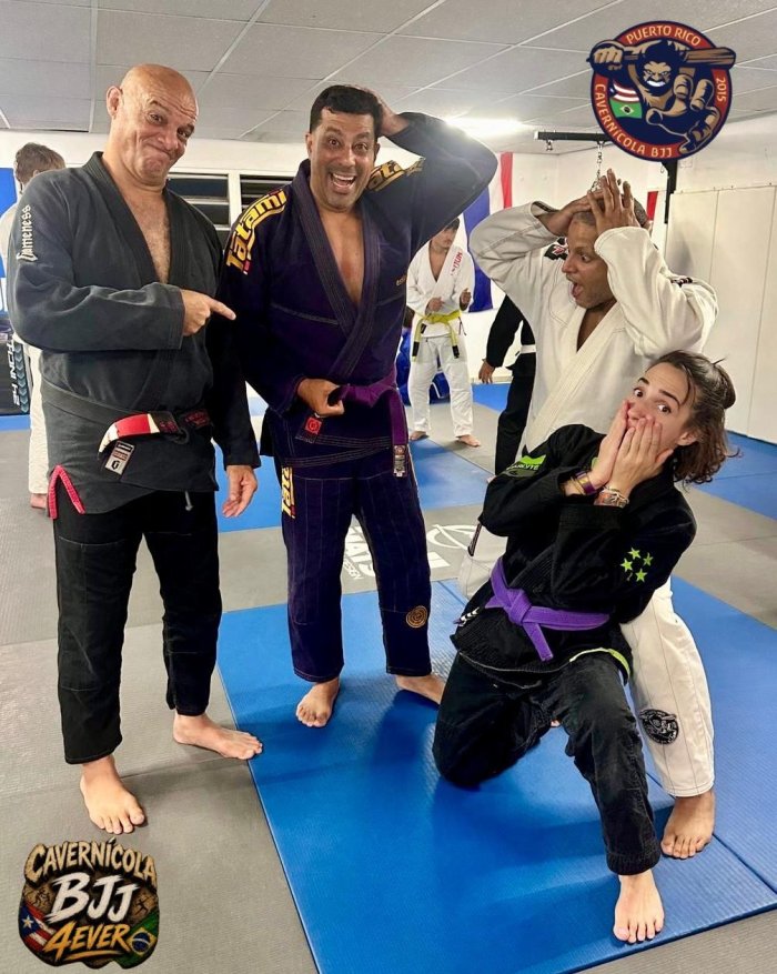 Purple belt · June 4, 2026 · Promoted by Prof. Carlos “Cavernícola” Rodríguez