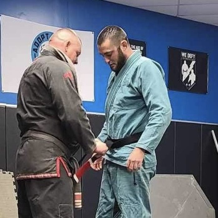 Receiving my black belt 4-15-2024