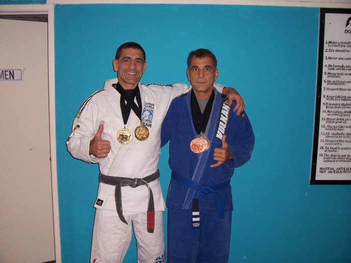 Coach Daniel Thomas  and I after a tournament On The Mat