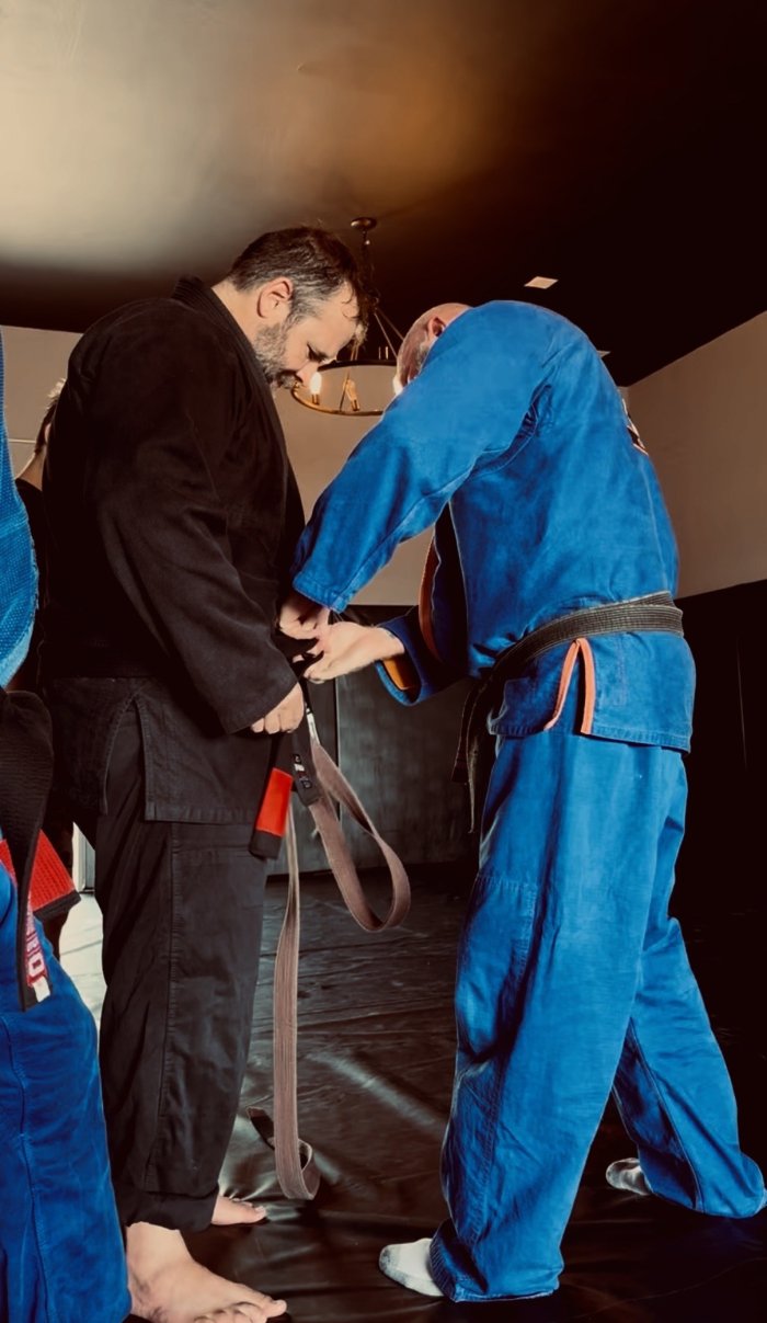 Black belt · August 15, 2026 · Promoted by John Jensen under John Ouano