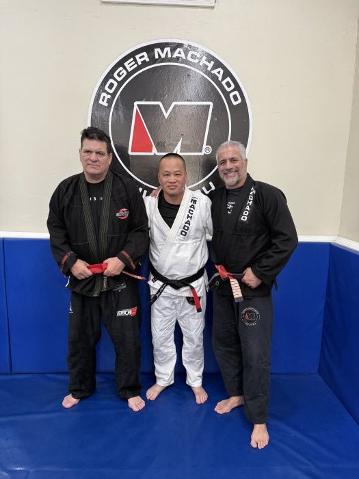 With 9th degree red belt Grandmaster Rigan Machado and 7th degree coral belt Master Roger Machado