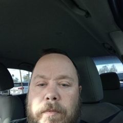 TRAVIS DAVIDSON